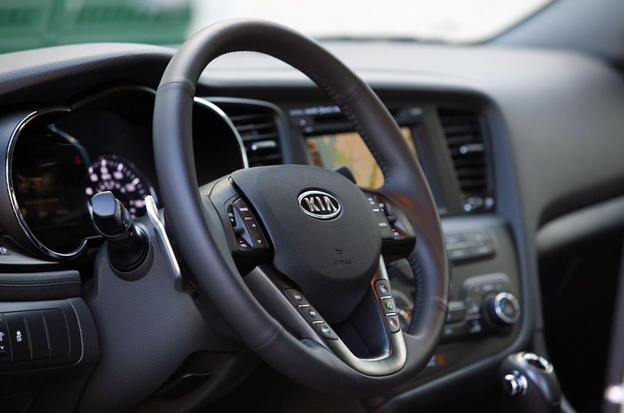  Kia Optima 2.0T 2011 года  (фото 21 из 38)
